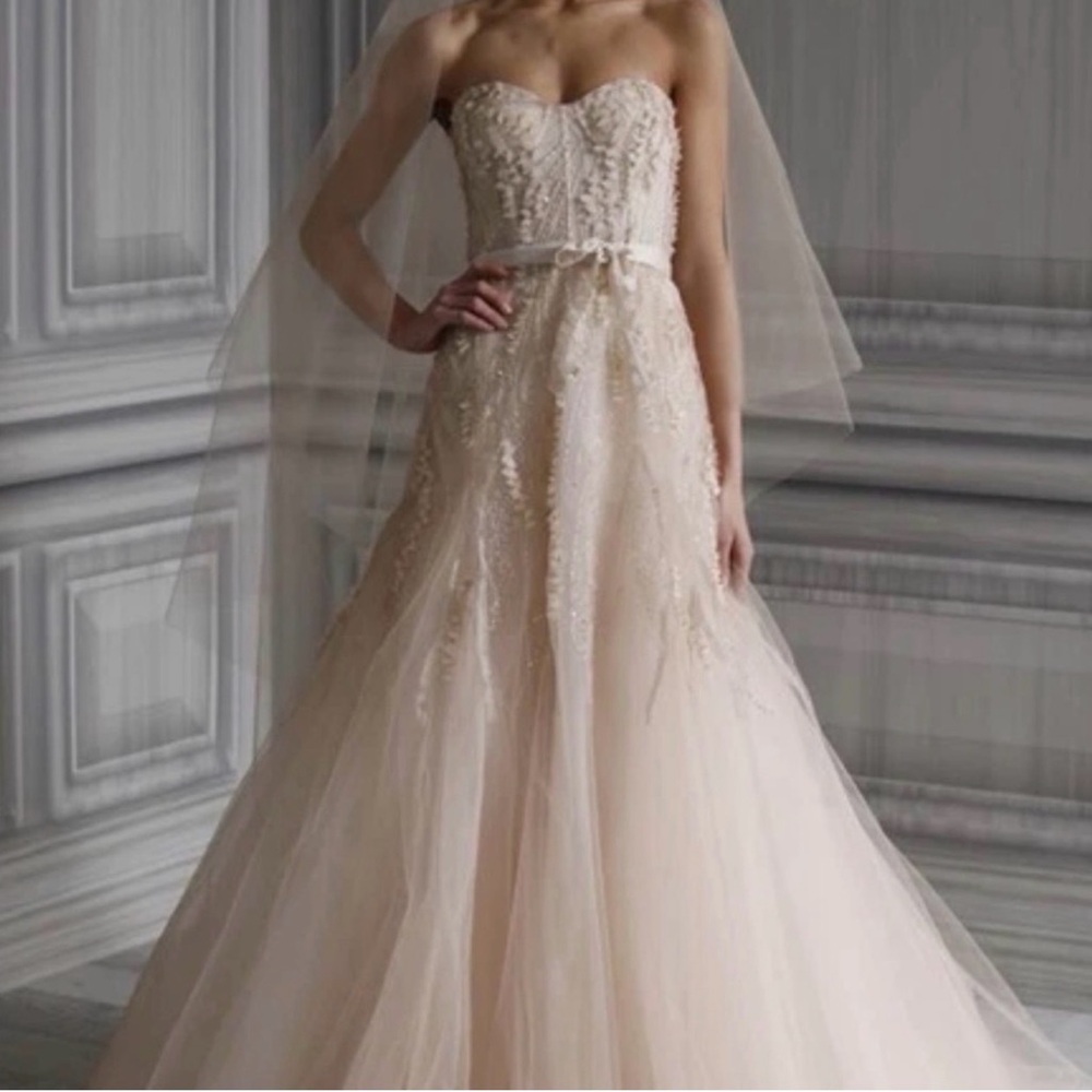 Size 6 (tailored to more like a 4) Monique Ihuiller Candy dress in blush.